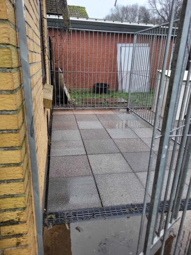 fliserensning af hundegår